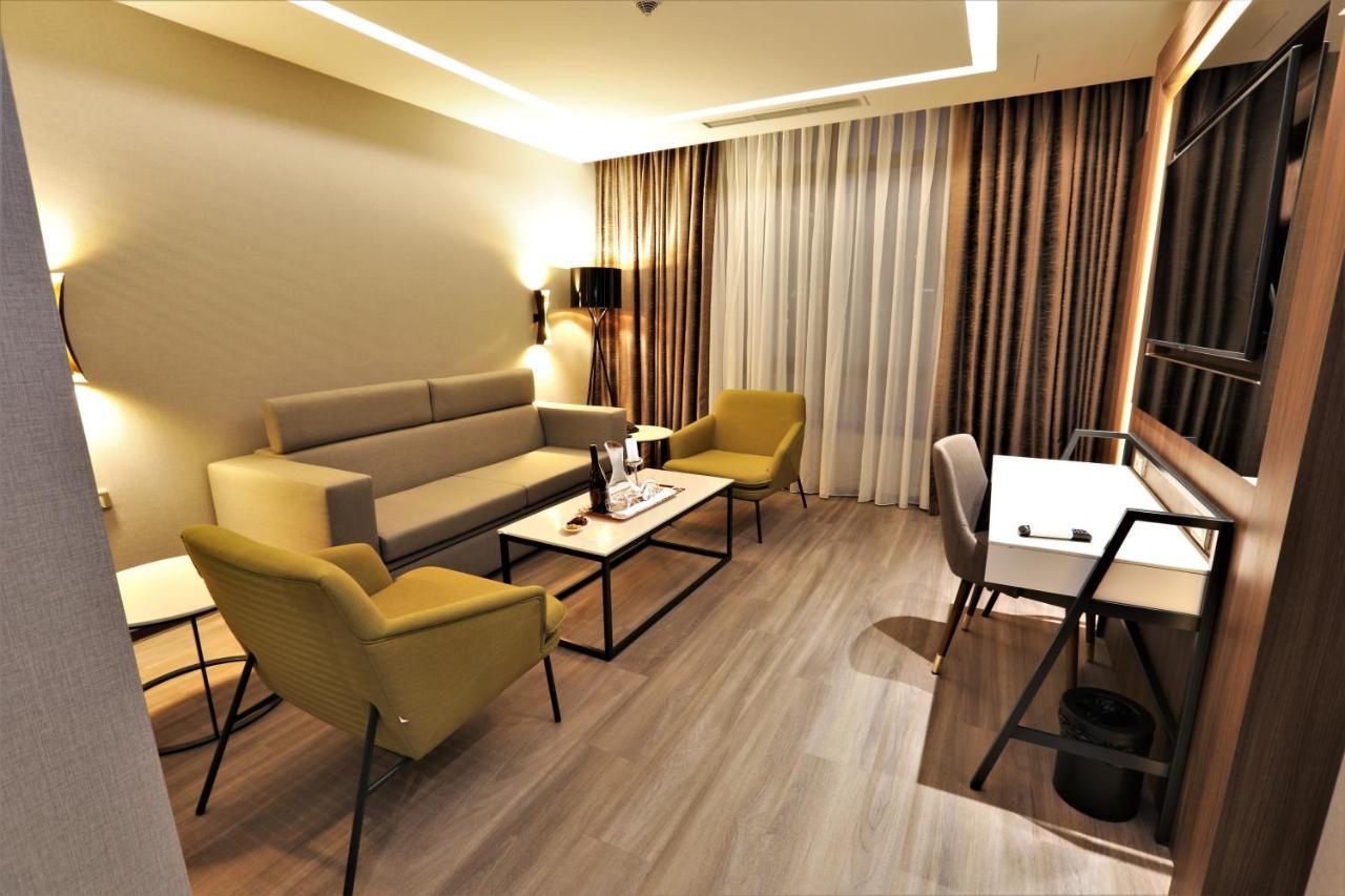 Limak Skopje Luxury Hotel Bagian luar foto 3D rendering of a living room